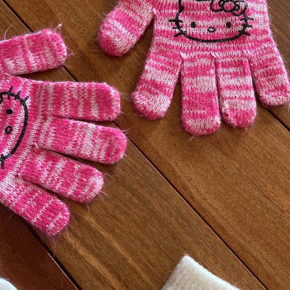 Two sets of girls gloves